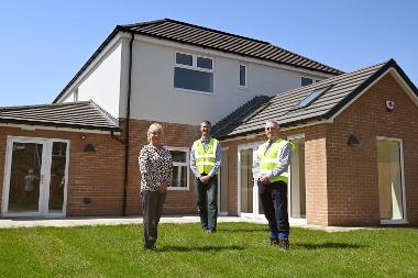 Liz McHugh is pictured with Duncan Rae, Project Manager from Dome Project Management and Ken Parkin, Managing Director of Able Construction, at the new Children’s home in South Shields.